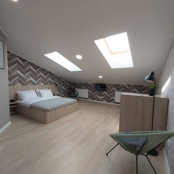 Фотографии Апартаменты Two-Bedroom Attic Apartment г. Львов (Украина) №2 Фото Апартаменты Two-Bedroom Attic Apartment г. Львов 2