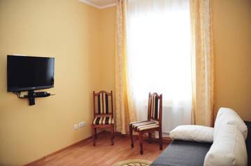 Фото номера Улучшенный семейный номер Отель Etna Hotel г. Львов 4
