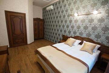 Фото номера Семейный люкс с 2 спальнями Отель Mini-Hotel Guest House Inn Lviv г. Львов 5