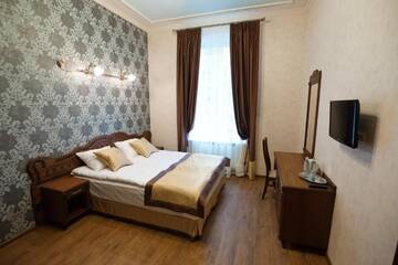 Фото номера Семейный люкс с 2 спальнями Отель Mini-Hotel Guest House Inn Lviv г. Львов 8