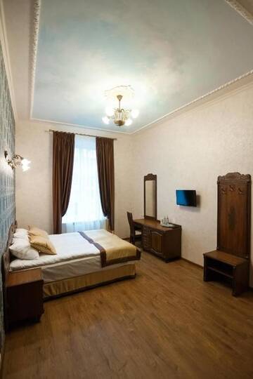 Фото номера Семейный люкс с 2 спальнями Отель Mini-Hotel Guest House Inn Lviv г. Львов 9