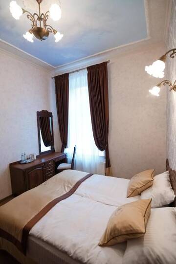 Фото номера Семейный люкс с 2 спальнями Отель Mini-Hotel Guest House Inn Lviv г. Львов 13