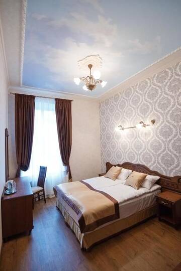 Фото номера Семейный люкс с 2 спальнями Отель Mini-Hotel Guest House Inn Lviv г. Львов 14
