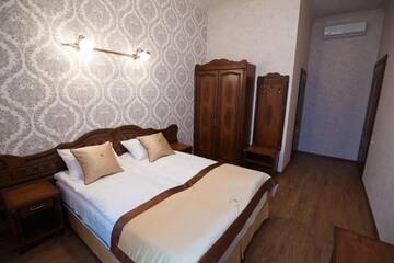 Фото номера Семейный люкс с 2 спальнями Отель Mini-Hotel Guest House Inn Lviv г. Львов 11