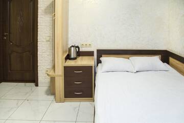 Фото номера Большой двухместный номер с 1 кроватью Отель Economy Express Voyage Lviv г. Львов 8