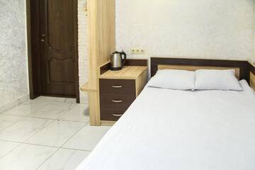 Фото номера Большой двухместный номер с 1 кроватью Отель Economy Express Voyage Lviv г. Львов 7