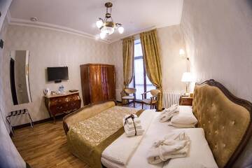 Фото номера Двухместный номер «Комфорт» с 1 кроватью Отель Saint Feder Boutique Hotel г. Львов 4