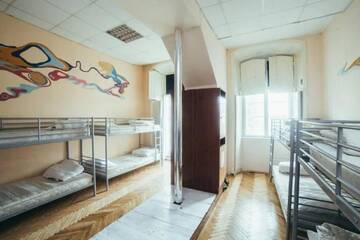 Фото номера Односпальная кровать в общем номере с 10 кроватями Хостелы Art Hostel г. Львов 4
