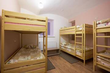 Фото номера Односпальная кровать в общем номере с 6 кроватями Хостелы Apart Comfort Plus г. Львов 8