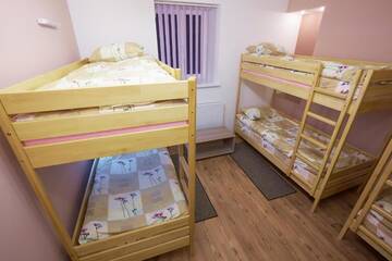 Фото номера Односпальная кровать в общем номере с 6 кроватями Хостелы Apart Comfort Plus г. Львов 11