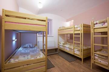 Фото номера Односпальная кровать в общем номере с 6 кроватями Хостелы Apart Comfort Plus г. Львов 4