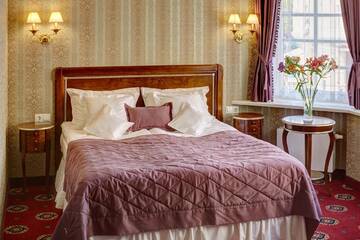 Фото номера Двухместный номер Делюкс с 1 кроватью и балконом Отель Hotel Atlas Deluxe г. Львов 3