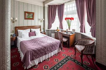 Фото номера Двухместный номер Делюкс с 1 кроватью и балконом Отель Hotel Atlas Deluxe г. Львов 10