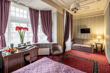 Фото номера Двухместный номер Делюкс с 1 кроватью и балконом Отель Hotel Atlas Deluxe г. Львов 5