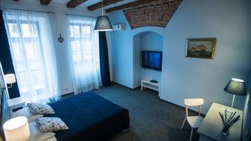 Фото номера Двухместный номер Делюкс с 1 кроватью и балконом Отель Central Hotel г. Львов 5