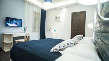 Фото номера Бюджетный двухместный номер с 1 кроватью (без окна) Отель Central Hotel г. Львов 4