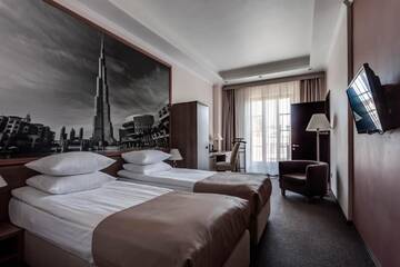 Фото номера Семейный номер Отель Rius Hotel г. Львов 3