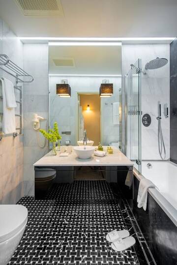 Фото номера Улучшенный двухместный номер с 1 кроватью Отель Astoria Hotel г. Львов 7