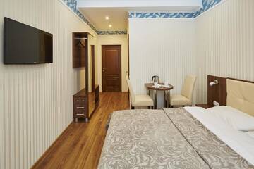 Фото номера Стандартный двухместный номер с 1 кроватью Отель Three Crowns Hotel г. Львов 4