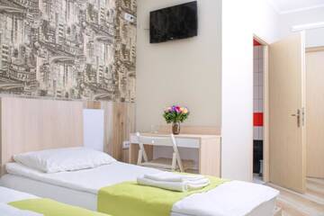 Фото номера Стандартный двухместный номер с 2 отдельными кроватями Отель Urban Hotel г. Львов 3