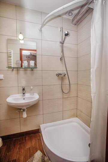 Фото номера Трехместный номер эконом-класса Гостевой дом Guest House "Arkhistratyg" г. Львов 5