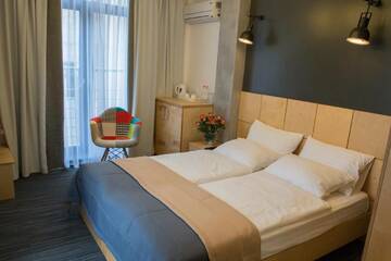 Фото номера Двухместный номер «Комфорт» с 1 кроватью Отель Etude Hotel г. Львов 12