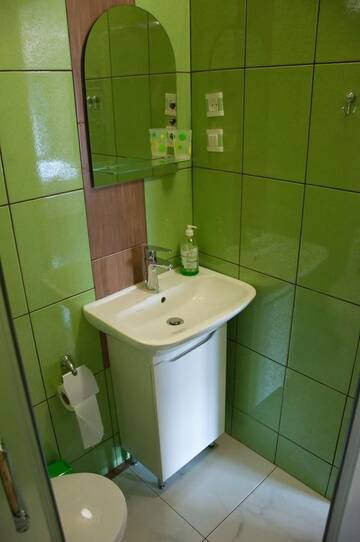 Фото номера Четырехместный номер с ванной комнатой Гостевой дом Guest House Lviv г. Львов 3