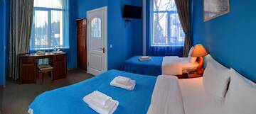 Фото номера Стандартный трехместный номер Отель Orange Hotel г. Львов 3