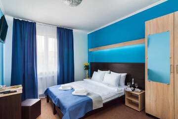 Фото номера Большой двухместный номер с 1 кроватью Отель Orange Hotel г. Львов 4