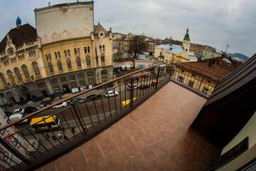 Фото номера Двухместный номер Делюкс с 1 кроватью и балконом Отель Отель Цісар г. Львов 2