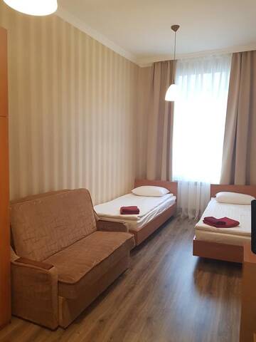 Фото номера Апартаменты эконом-класса с 3 спальнями Отель Apart-Hotel City Center Contrabas г. Львов 3