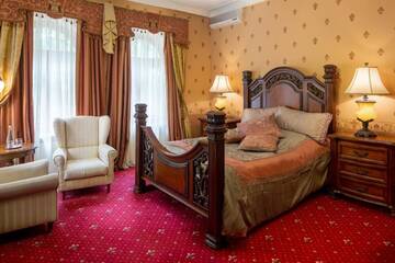Фото номера Королевский люкс Гостевой дом Luxury Boutique Andreevskiy г. Львов 2