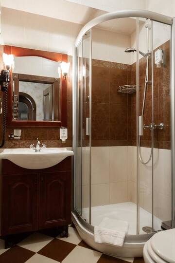 Фото номера Классический люкс с балконом Гостевой дом Luxury Boutique Andreevskiy г. Львов 6