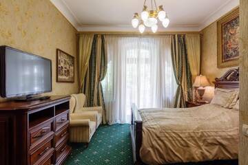 Фото номера Классический люкс с балконом Гостевой дом Luxury Boutique Andreevskiy г. Львов 9
