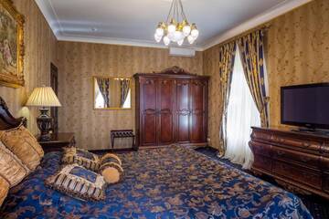 Фото номера Люкс «Премиум» Гостевой дом Luxury Boutique Andreevskiy г. Львов 5