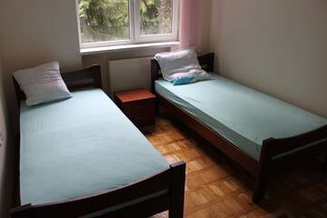 Фото номера Четырехместный номер с общей ванной комнатой Отель Bilia Parku Hotel г. Львов 2