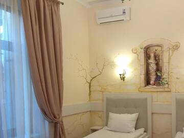 Фото номера Двухместный номер с 2 отдельными кроватями Отель Aparthotel NA DOBU г. Львов 7