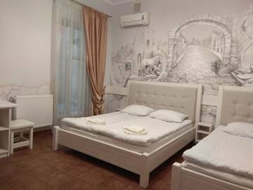 Фото номера Улучшенный двухместный номер с 1 кроватью Отель Aparthotel NA DOBU г. Львов 4