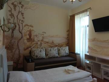 Фото номера Улучшенный двухместный номер с 2 отдельными кроватями Отель Aparthotel NA DOBU г. Львов 7