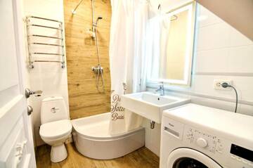 Фото номера Апартаменты с 2 спальнями Апартаменты Stylish apartment. Heart of the city г. Львов 15