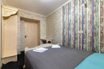 Фото номера Стандартный четырехместный номер Отель Family Hotel г. Львов 7