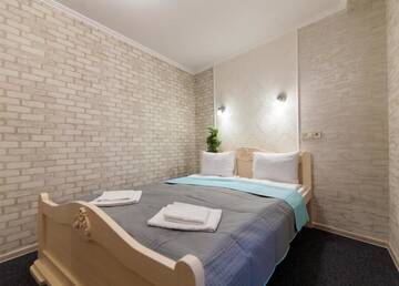 Фото номера Стандартный четырехместный номер Отель Family Hotel г. Львов 6