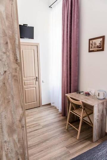 Фото номера Стандартный двухместный номер с 1 кроватью Мини-отель Mini-Hotel Freedom Mercurius г. Львов 28
