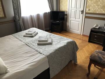 Фото номера Улучшенный номер с кроватью размера «king-size» Отель Fortetsya Malehiv г. Львов 10