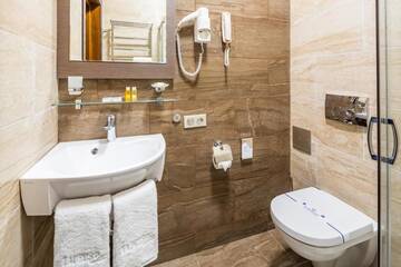 Фото номера Стандартный двухместный номер с 1 кроватью Отель Taurus City Hotel г. Львов 15