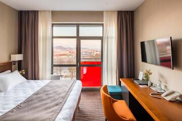 Фото номера Стандартный двухместный номер с 1 кроватью Отель Taurus City Hotel г. Львов 13