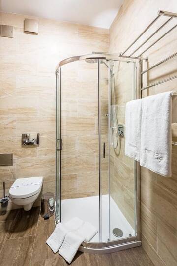 Фото номера Стандартный двухместный номер с 1 кроватью Отель Taurus City Hotel г. Львов 16