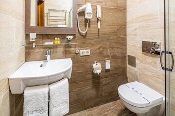 Фото номера Стандартный двухместный номер с 1 кроватью Отель Taurus City Hotel г. Львов 6