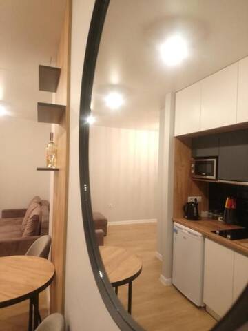 Фото номера Четырехместный номер с балконом Апартаменты New Point in the Centre г. Львов 28