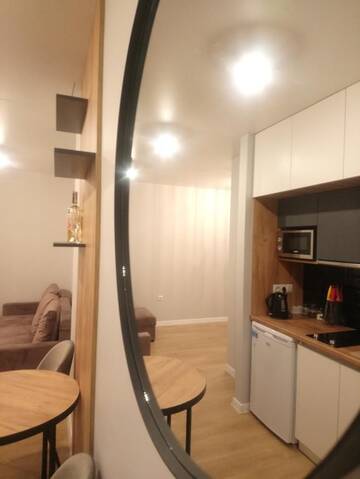 Фото номера Четырехместный номер с балконом Апартаменты New Point in the Centre г. Львов 14